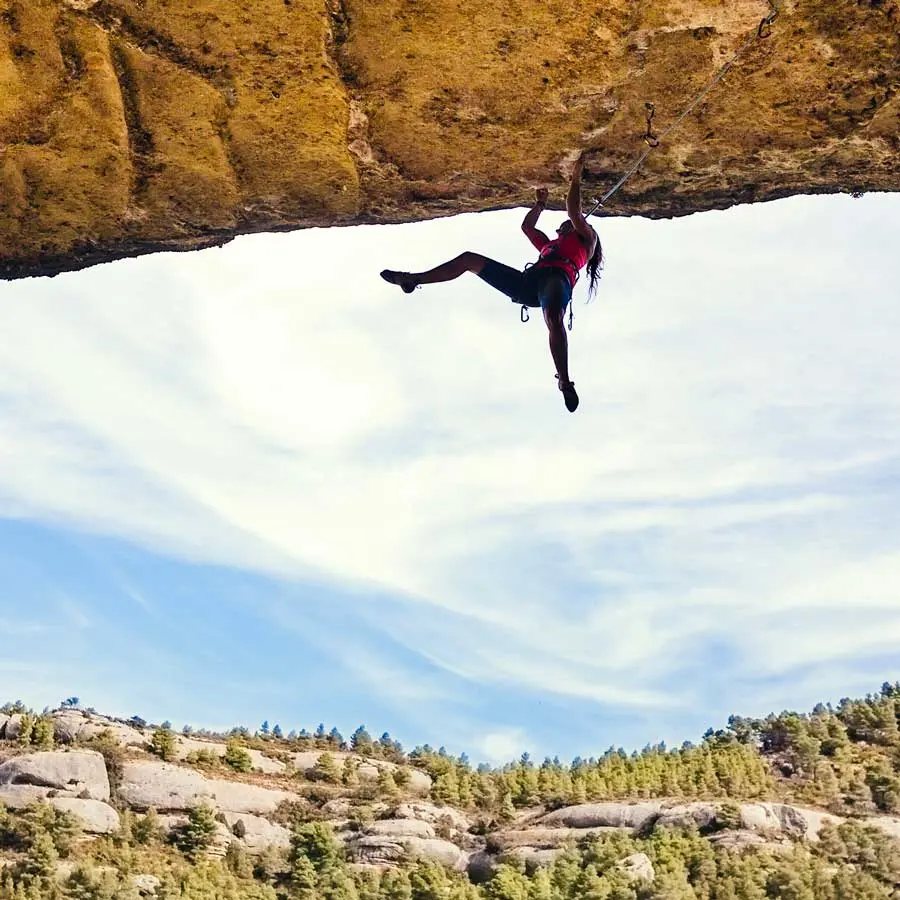 Risk management: climber hanging in an overhang