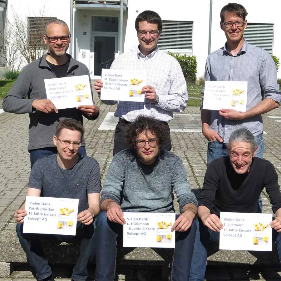 Six engineers celebrating 10 or 15 years with the company