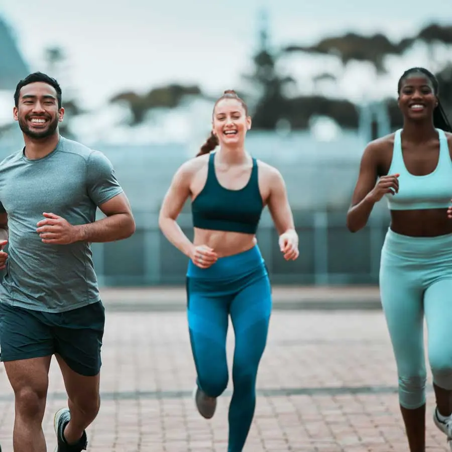 Four runners run towards the observer