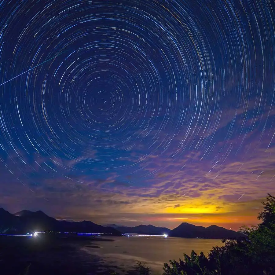 Night sky with star tracks