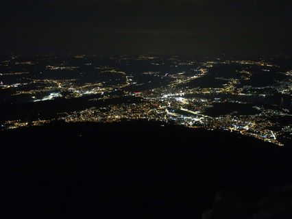 Sea of lights of the city of Lucerne seen from Mount Pilatus