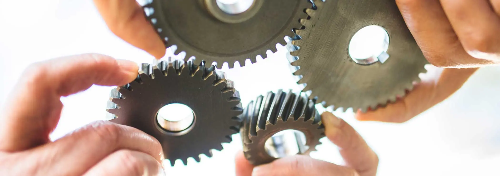 Gears engage each other