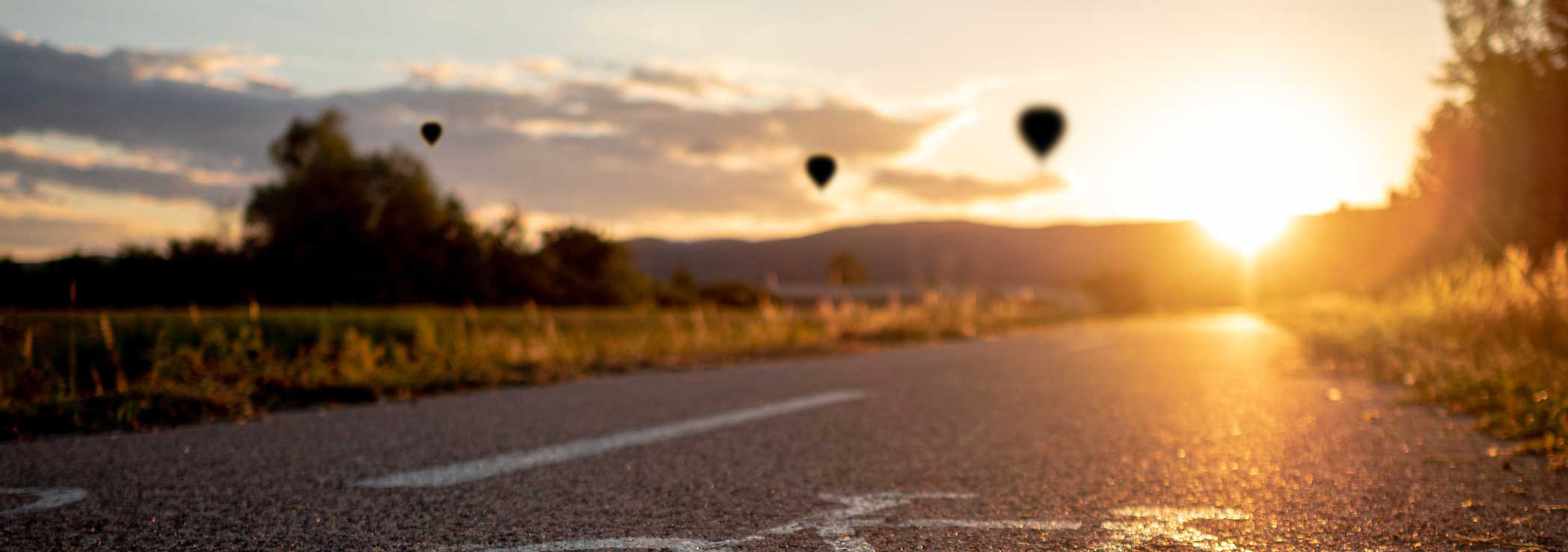 Blurred road into sunset